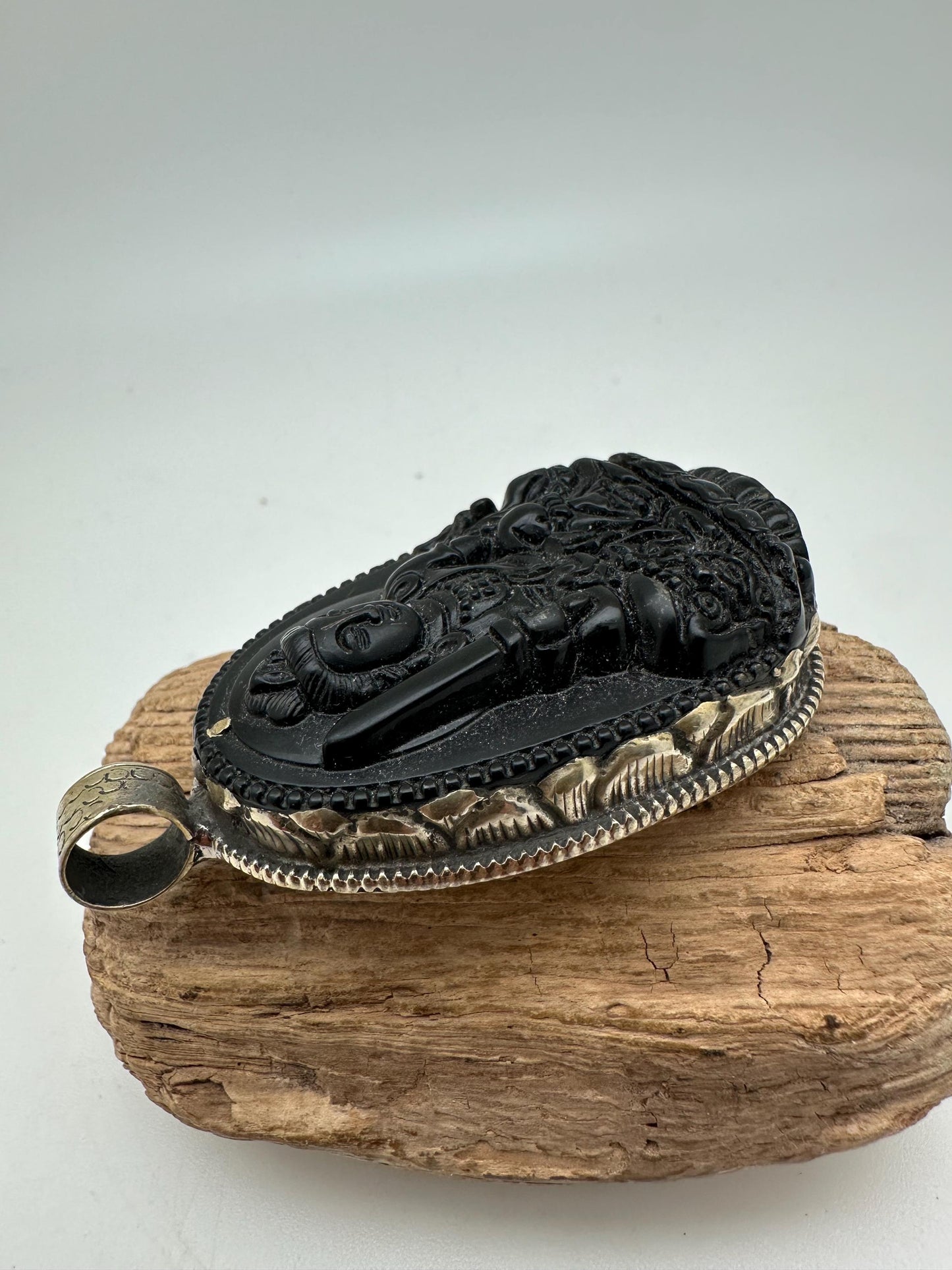 Obsidian manjusri, handcrafted with Tibetan silver
