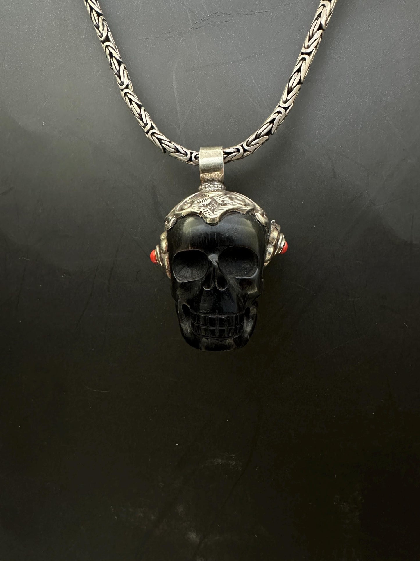 Horn skull present, set with coral , master handcrafted with Tibetan silver