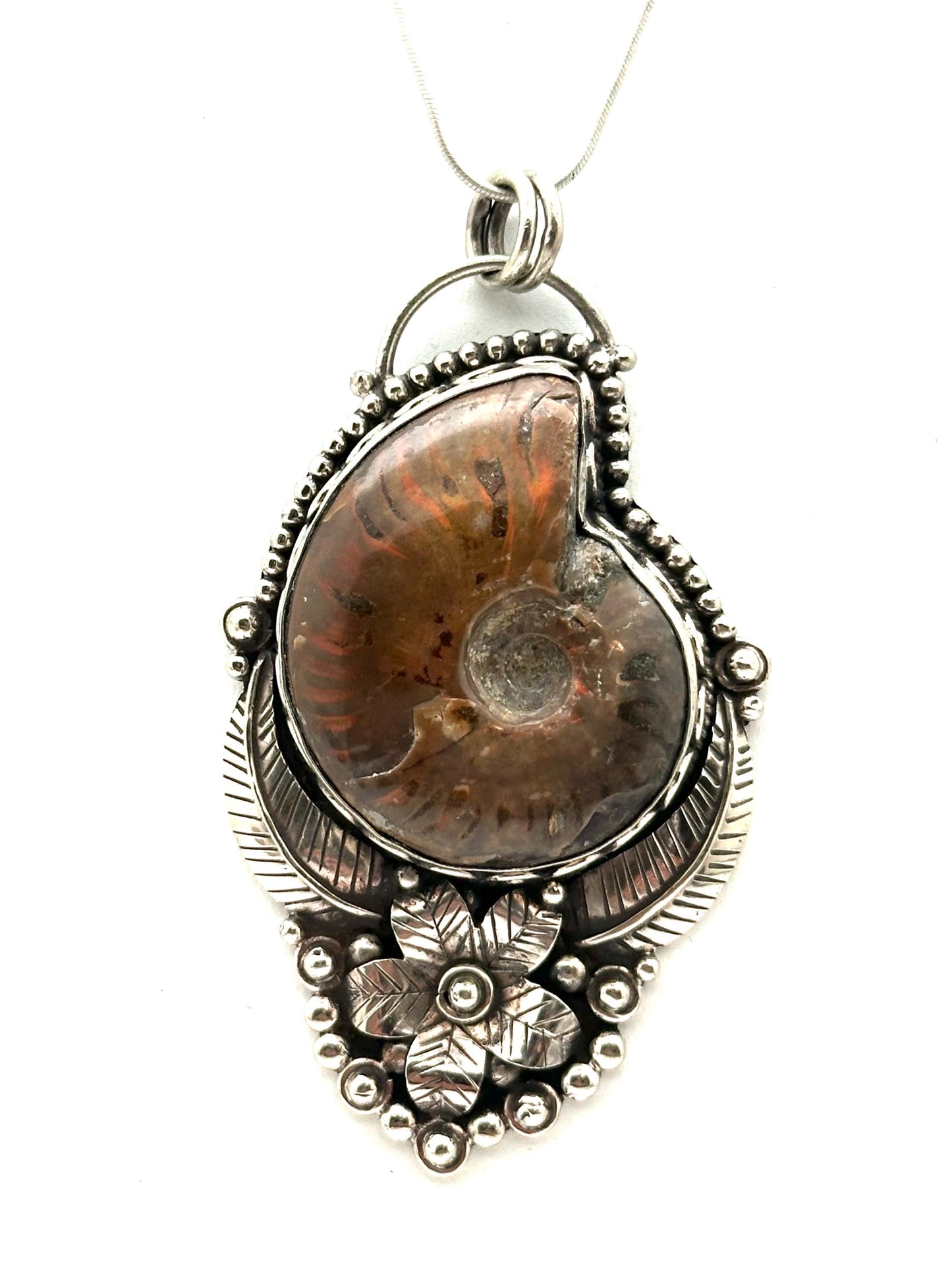 Ammonite fossil pendant, handcrafted, Tibetan silver,floral design,Nepalese,82mmX45mm weighs about 56 gm