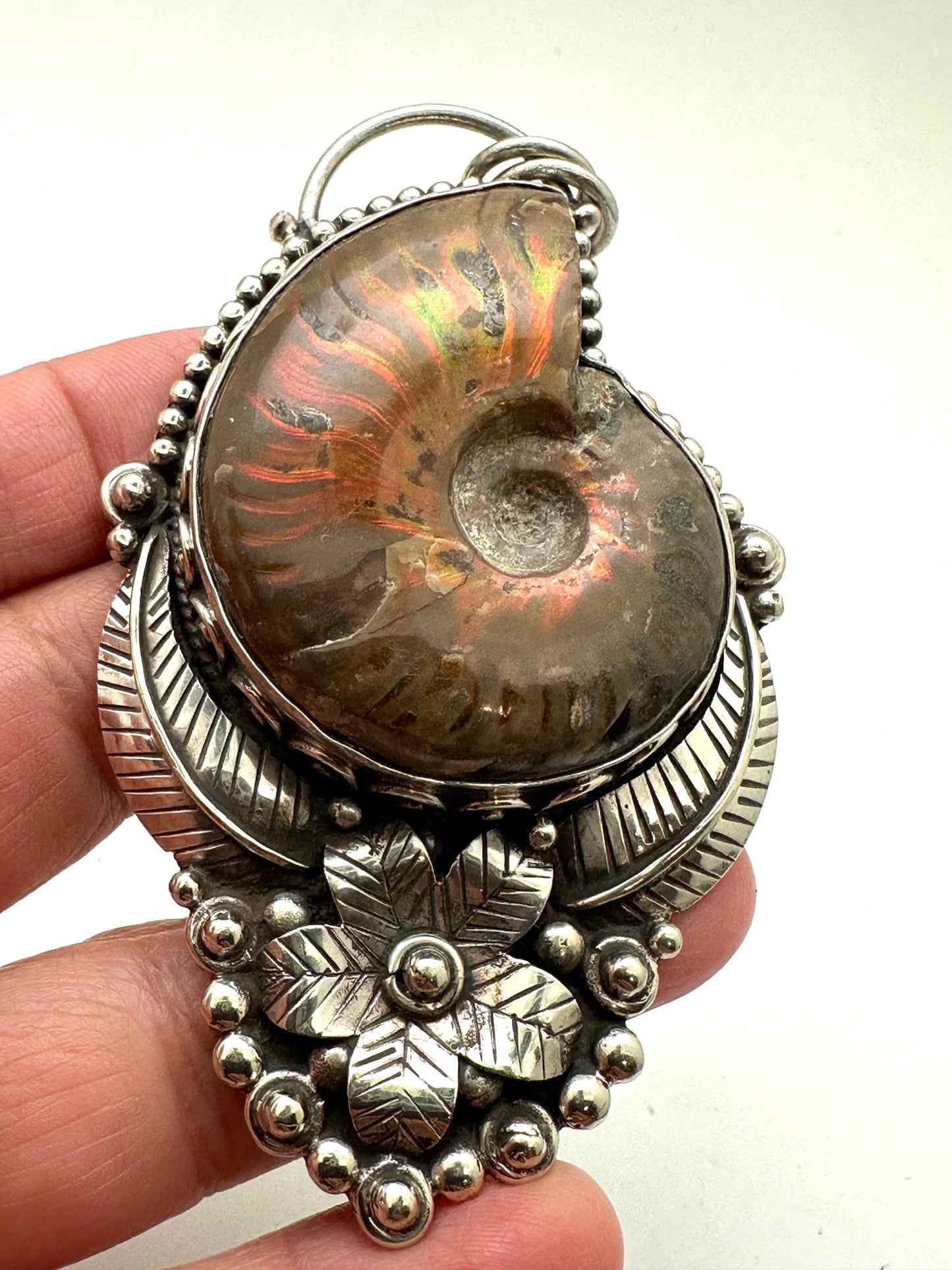 Ammonite fossil pendant, handcrafted, Tibetan silver,floral design,Nepalese,82mmX45mm weighs about 56 gm