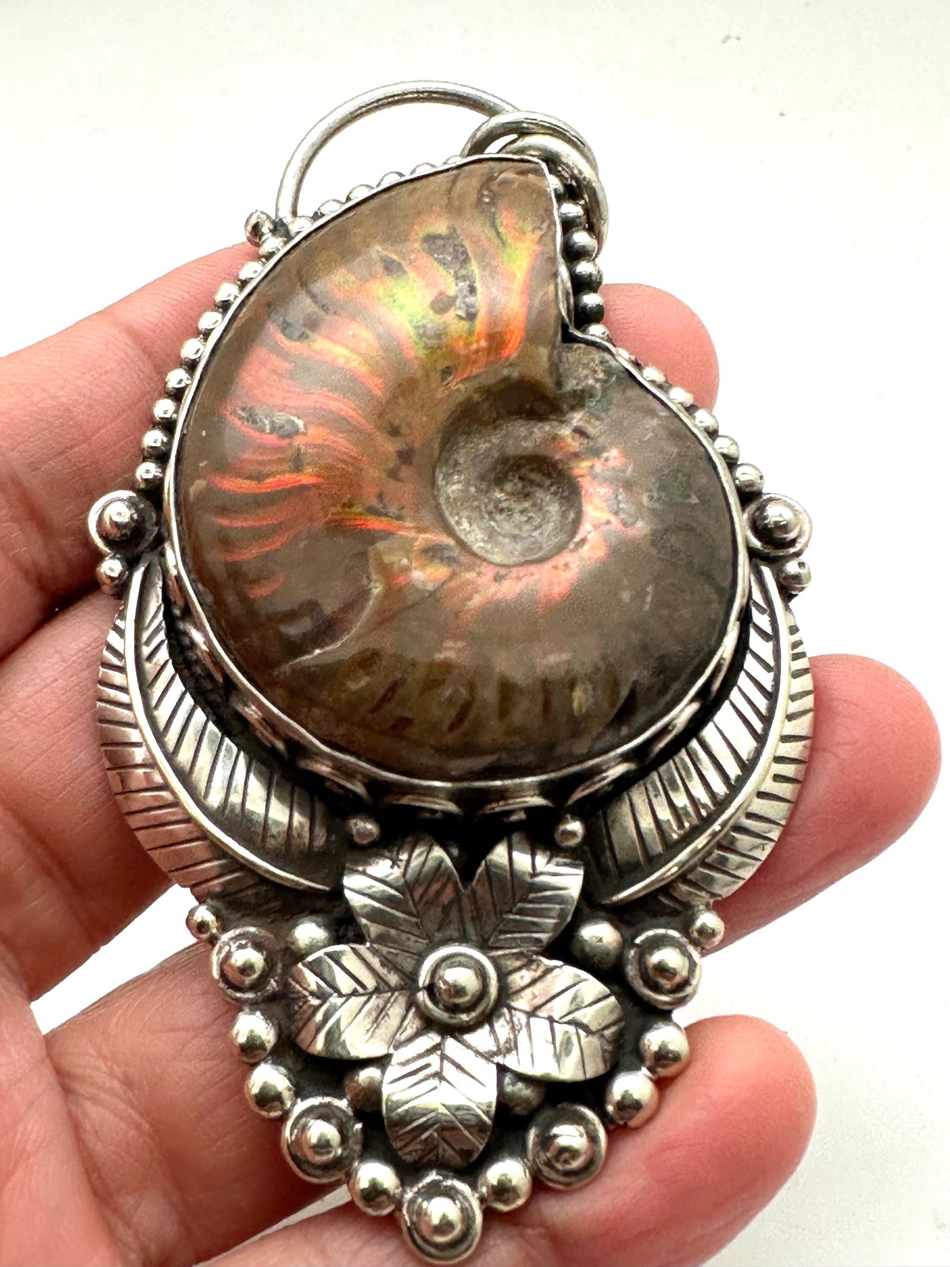 Ammonite fossil pendant, handcrafted, Tibetan silver,floral design,Nepalese,82mmX45mm weighs about 56 gm
