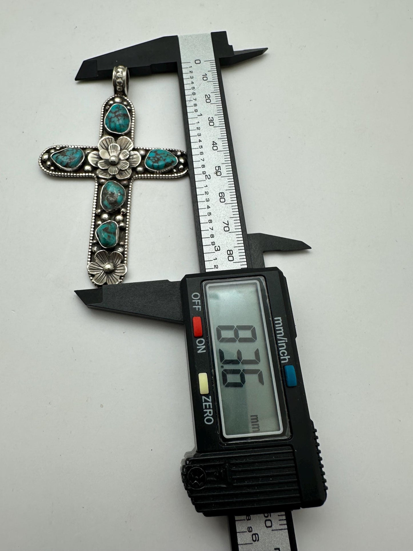 Handcrafted Tibetan Repousse Silver Cross Pendant with Turquoise, Floral Design
