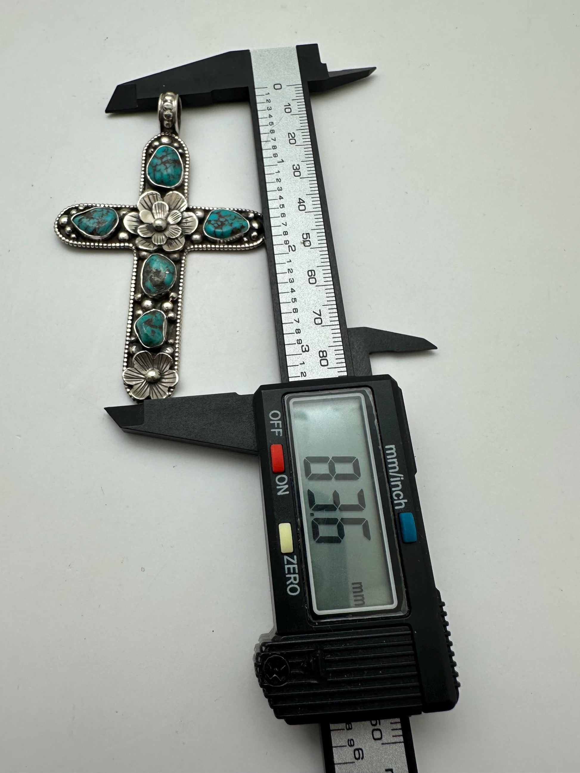 Handcrafted Tibetan Repousse Silver Cross Pendant with Turquoise, Floral Design