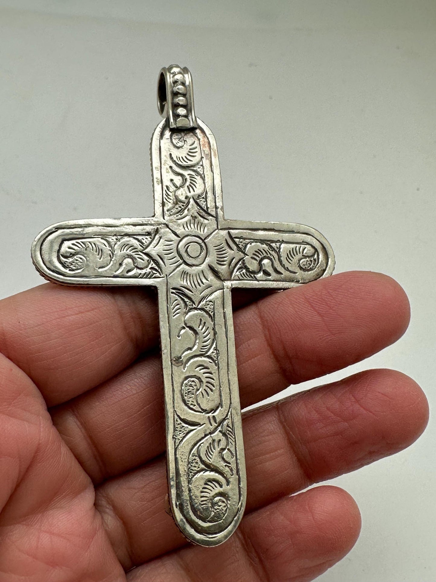 Handcrafted Tibetan Repousse Silver Cross Pendant with Turquoise, Floral Design
