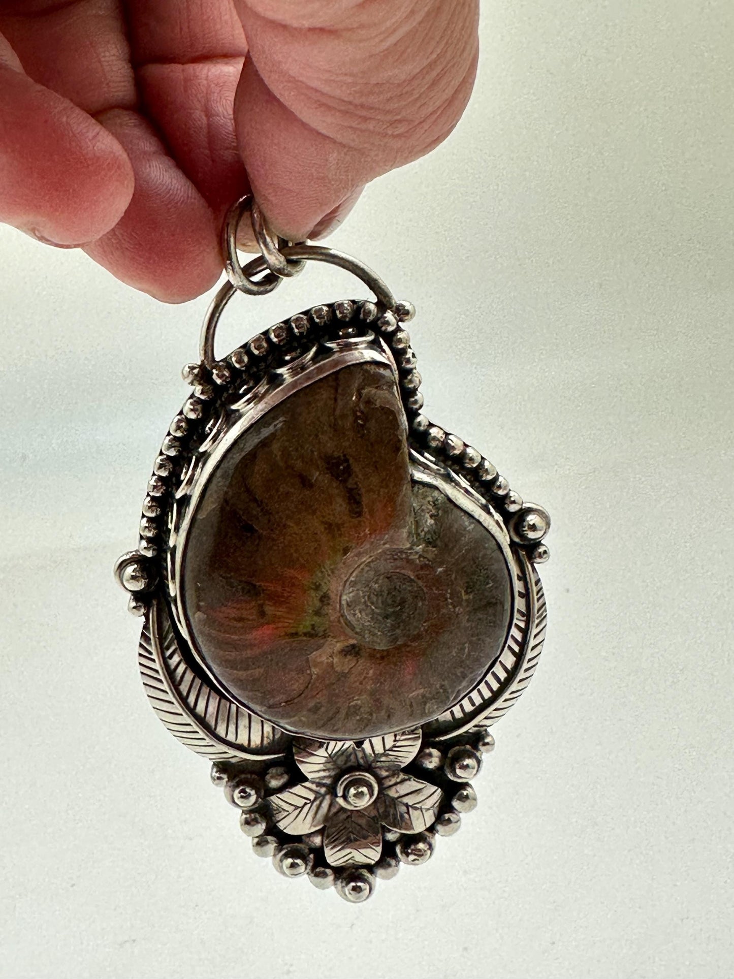 Ammonite fossil pendant, handcrafted, Tibetan silver,floral design,Nepalese,82mmX45mm weighs about 56 gm
