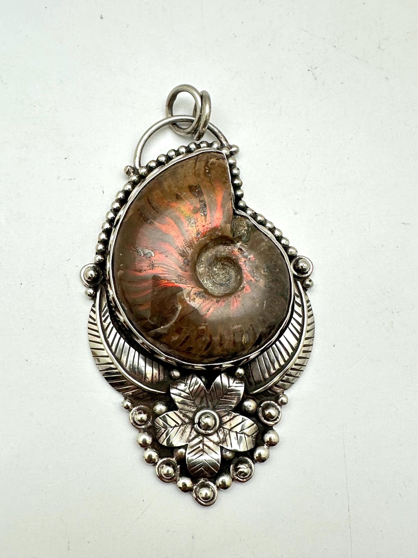 Ammonite fossil pendant, handcrafted, Tibetan silver,floral design,Nepalese,82mmX45mm weighs about 56 gm