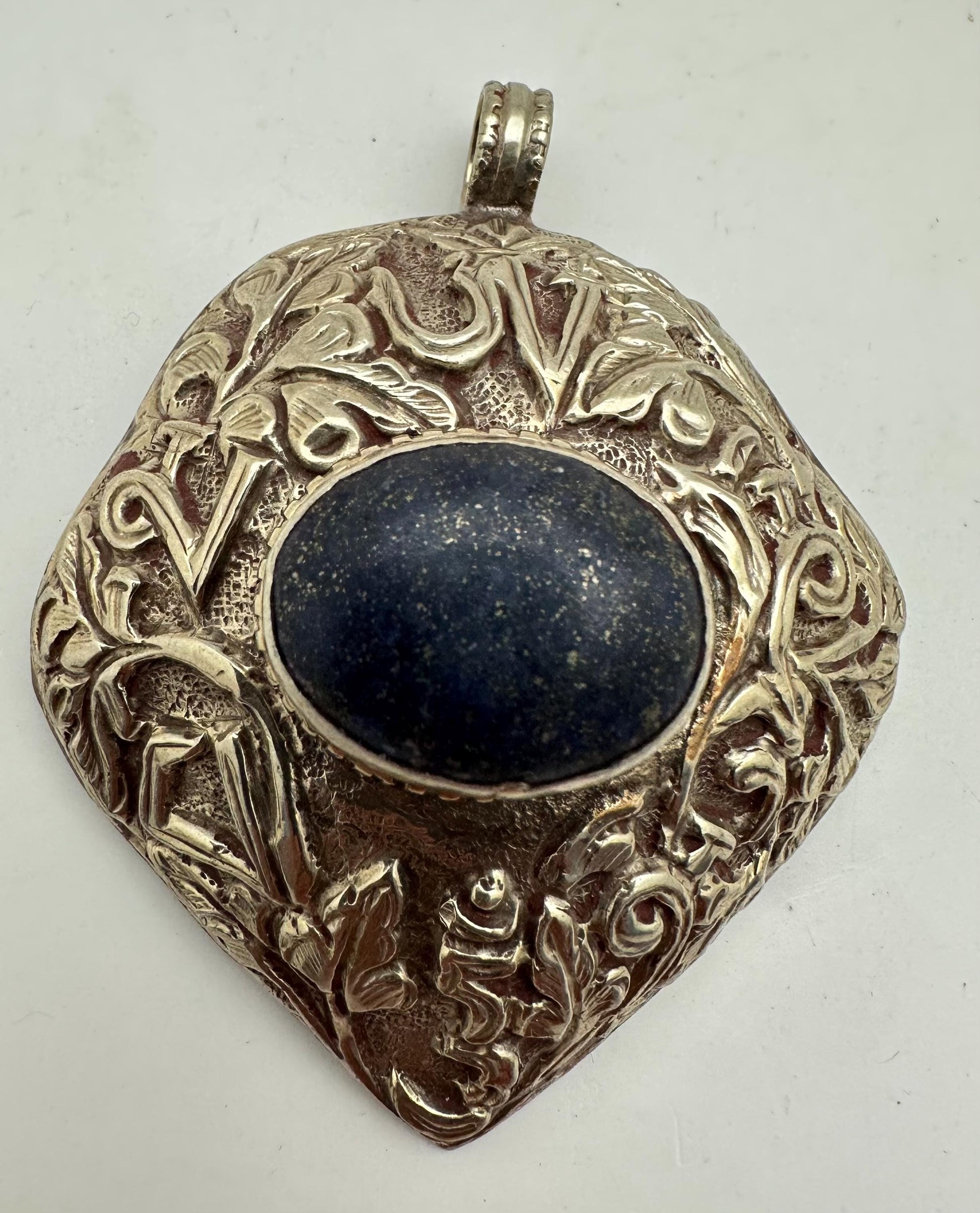 lapis pendant, handcrafted, tibetan repousse silver, Om mani padme hoon, floral, ethnic style,