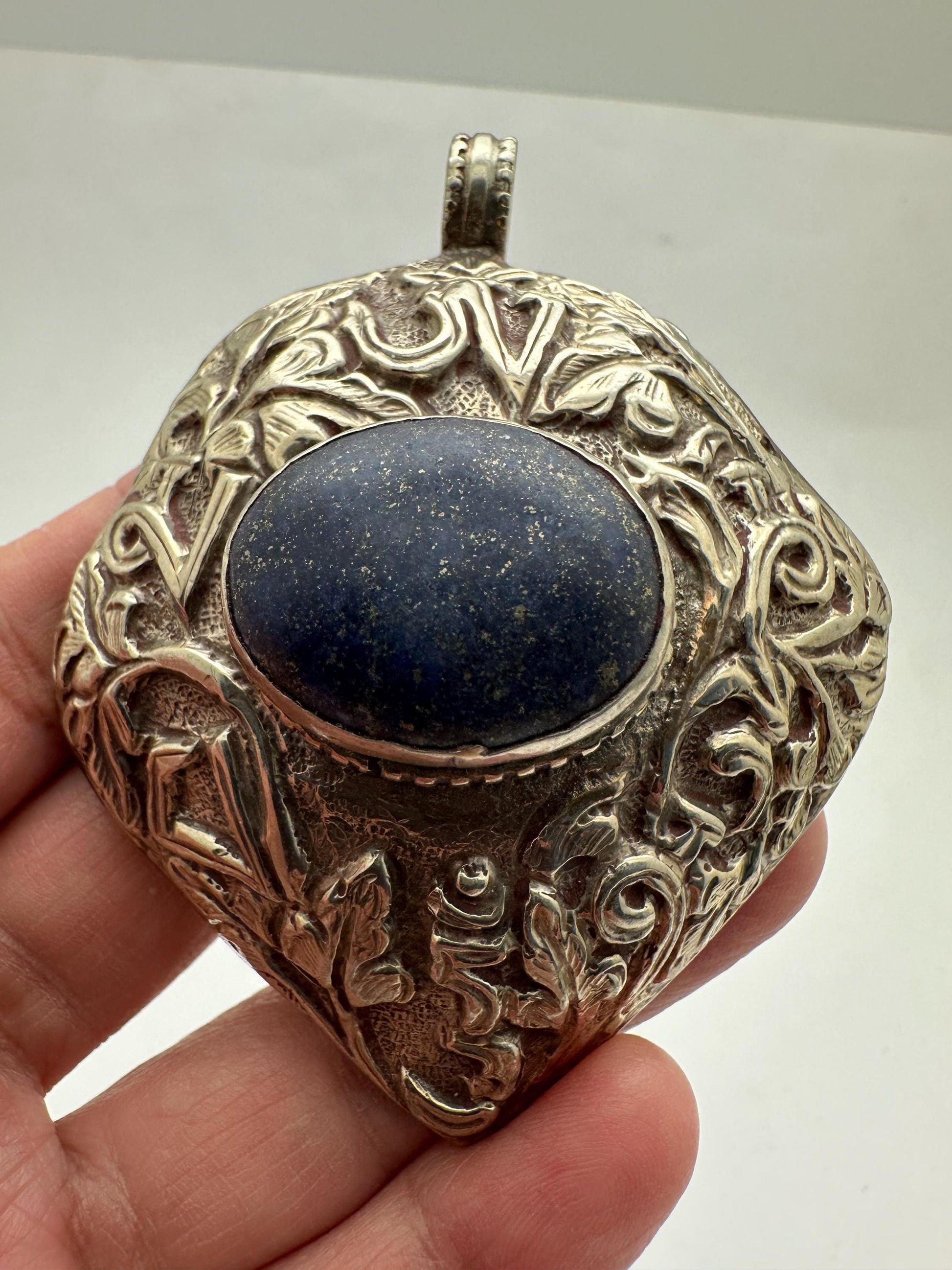 lapis pendant, handcrafted, tibetan repousse silver, Om mani padme hoon, floral, ethnic style,