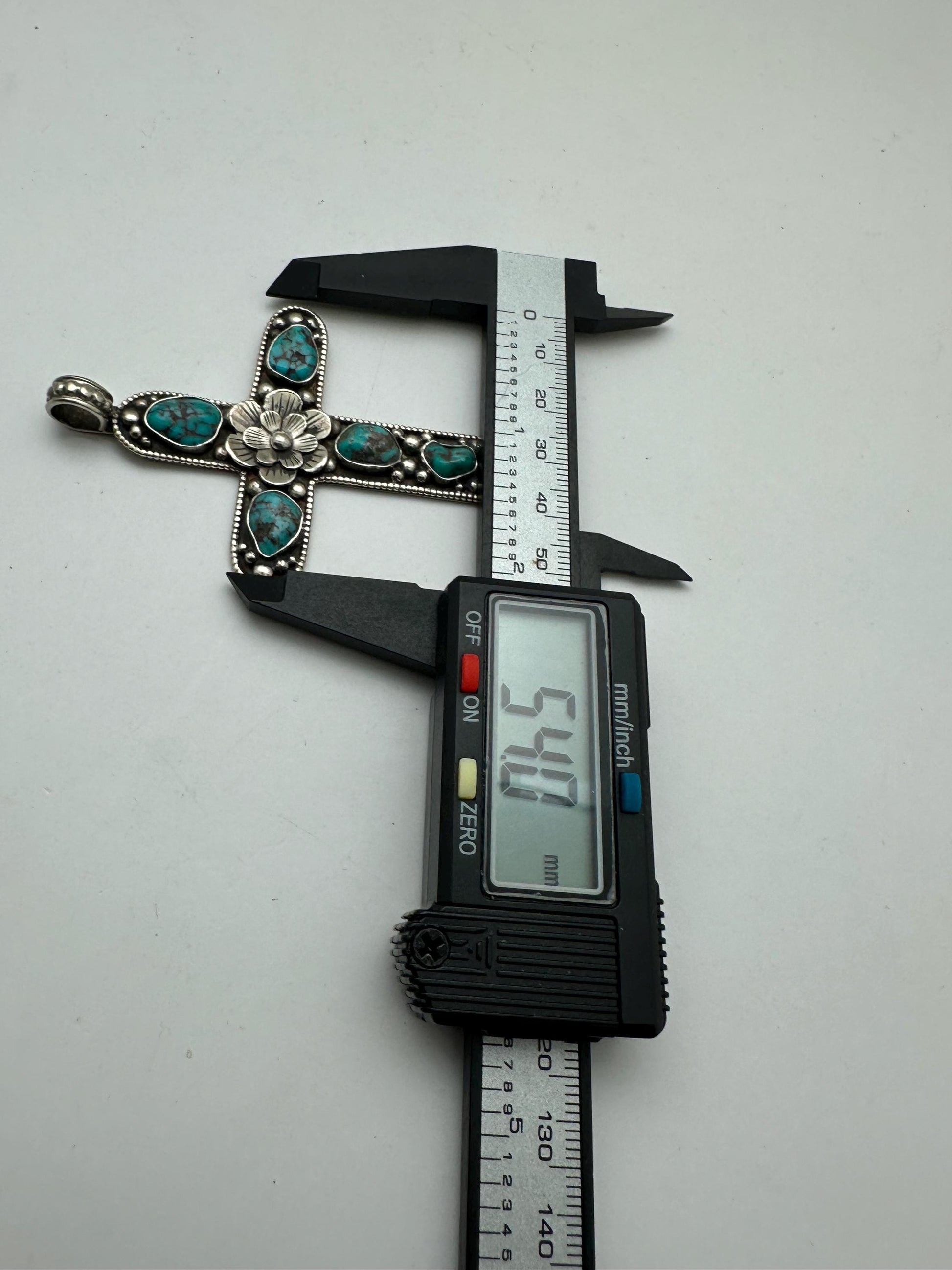 Handcrafted Tibetan Repousse Silver Cross Pendant with Turquoise, Floral Design