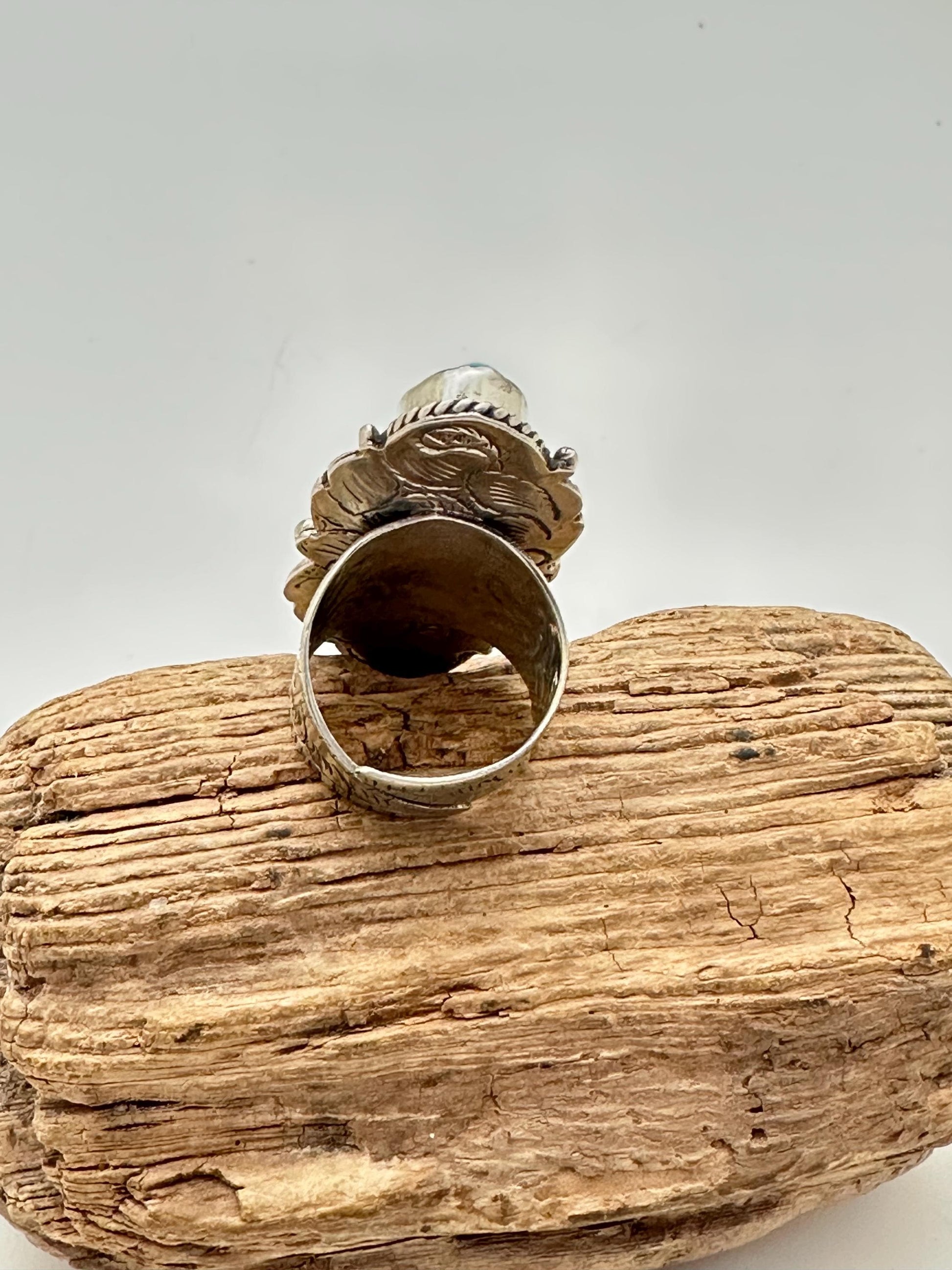 Turquoise ring, handcrafted, Tibetan silver, floral design,ethnic style,adjustable ,43mmX24mm weighs about 13gm