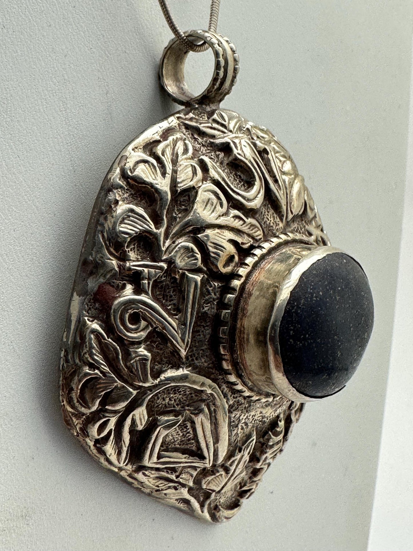 lapis pendant, handcrafted, tibetan repousse silver, Om mani padme hoon, floral, ethnic style,