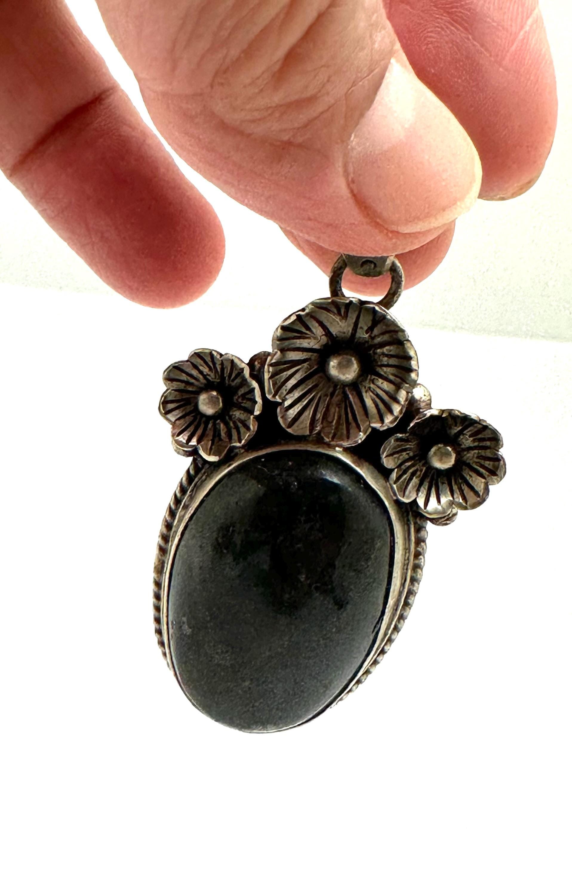 Labradorite pendant, handcrafted,tibetan repousse silver, floral design ,ethnic style,59mmX26mm