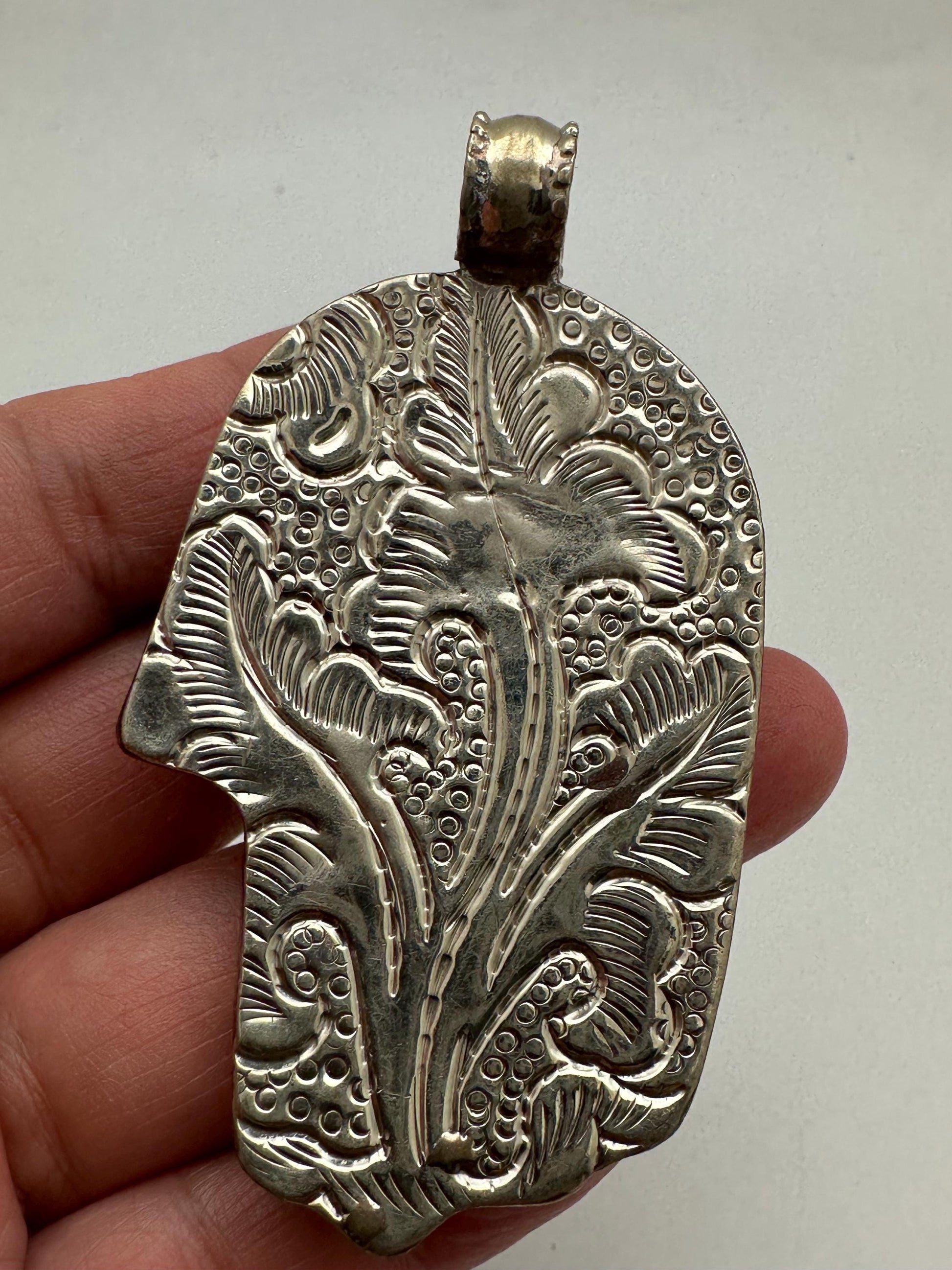 Hamsa pendant,handcrafted, Tibetan silver,pink stone,69mmX39mm and weighs about 29gm