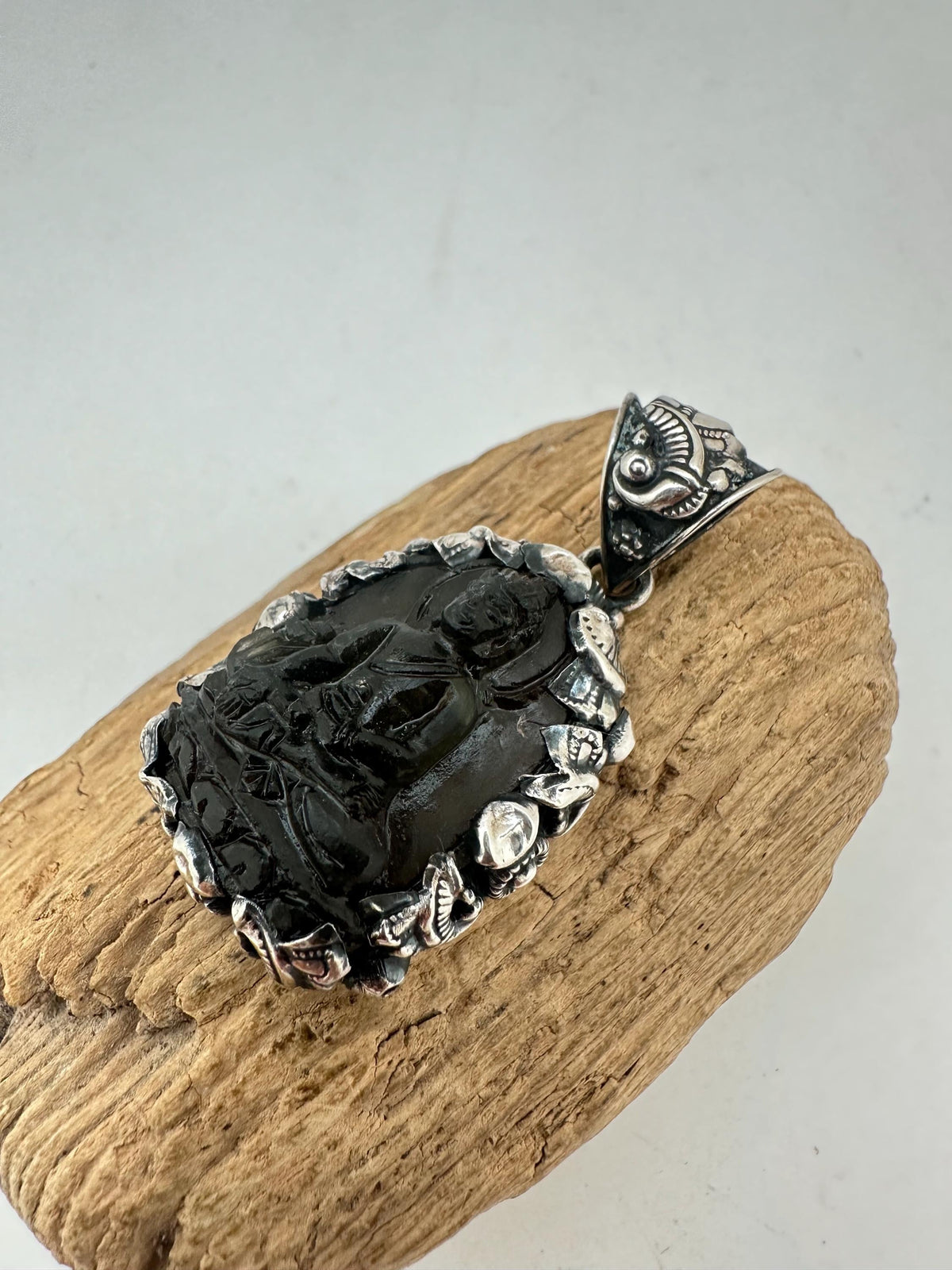 Moldabite medicine Buddha , extremely rare master handcrafted with sterling silver