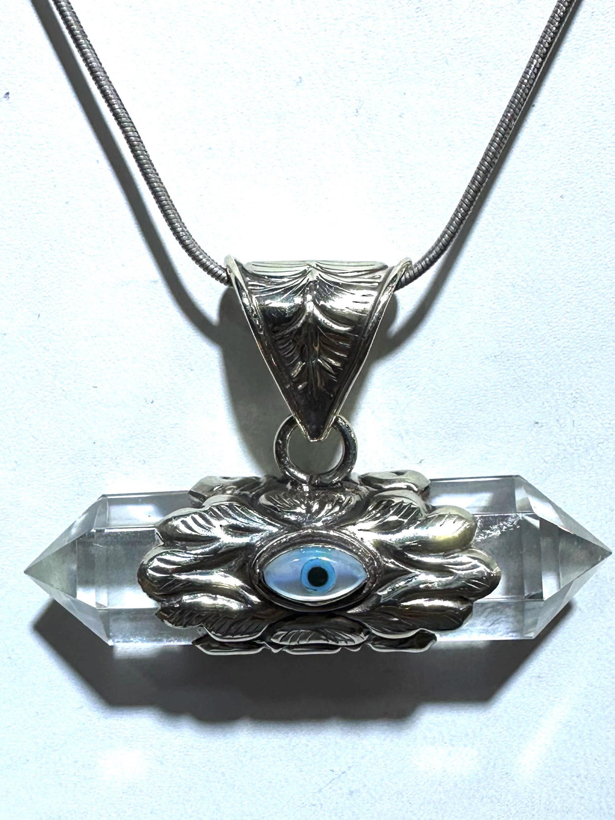 Evil eye pendant, double point Quartz crystal, handcrafted, Tibetan silver,