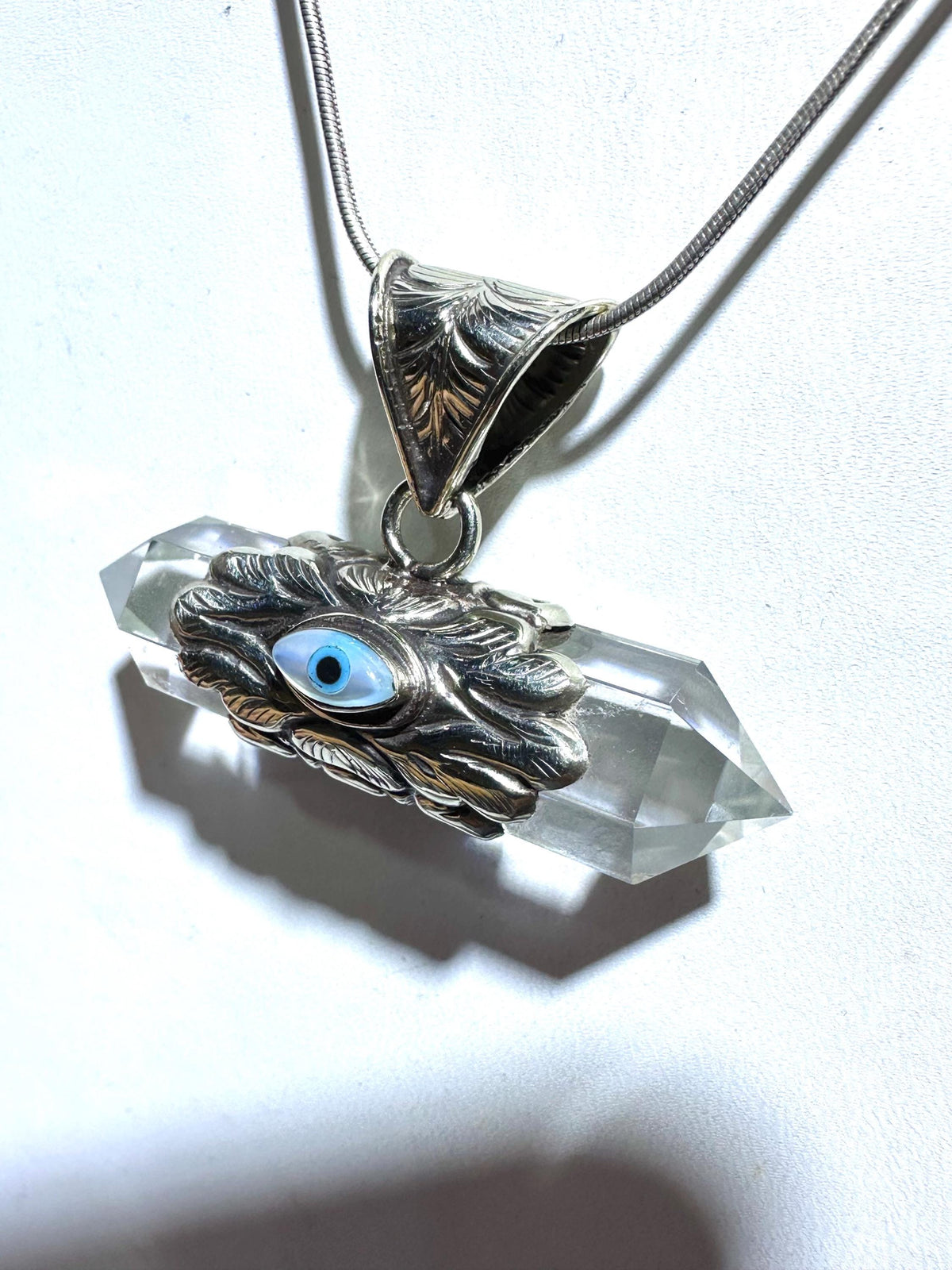 Evil eye pendant, double point Quartz crystal, handcrafted, Tibetan silver,