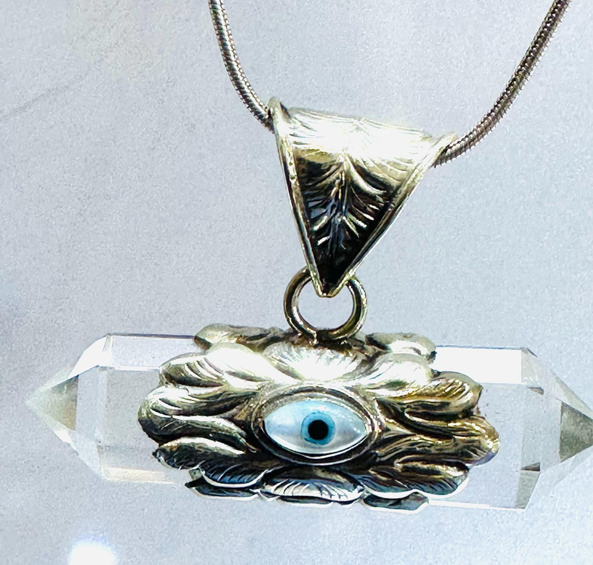 Evil eye pendant, double point Quartz crystal, handcrafted, Tibetan silver,