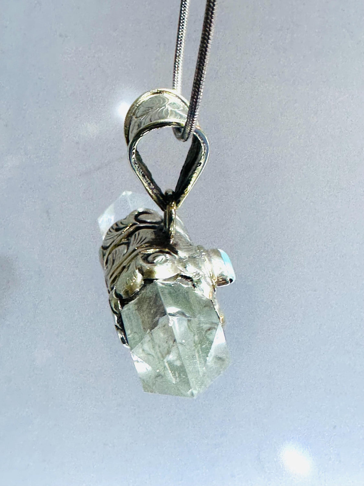Evil eye pendant, double point Quartz crystal, handcrafted, Tibetan silver,