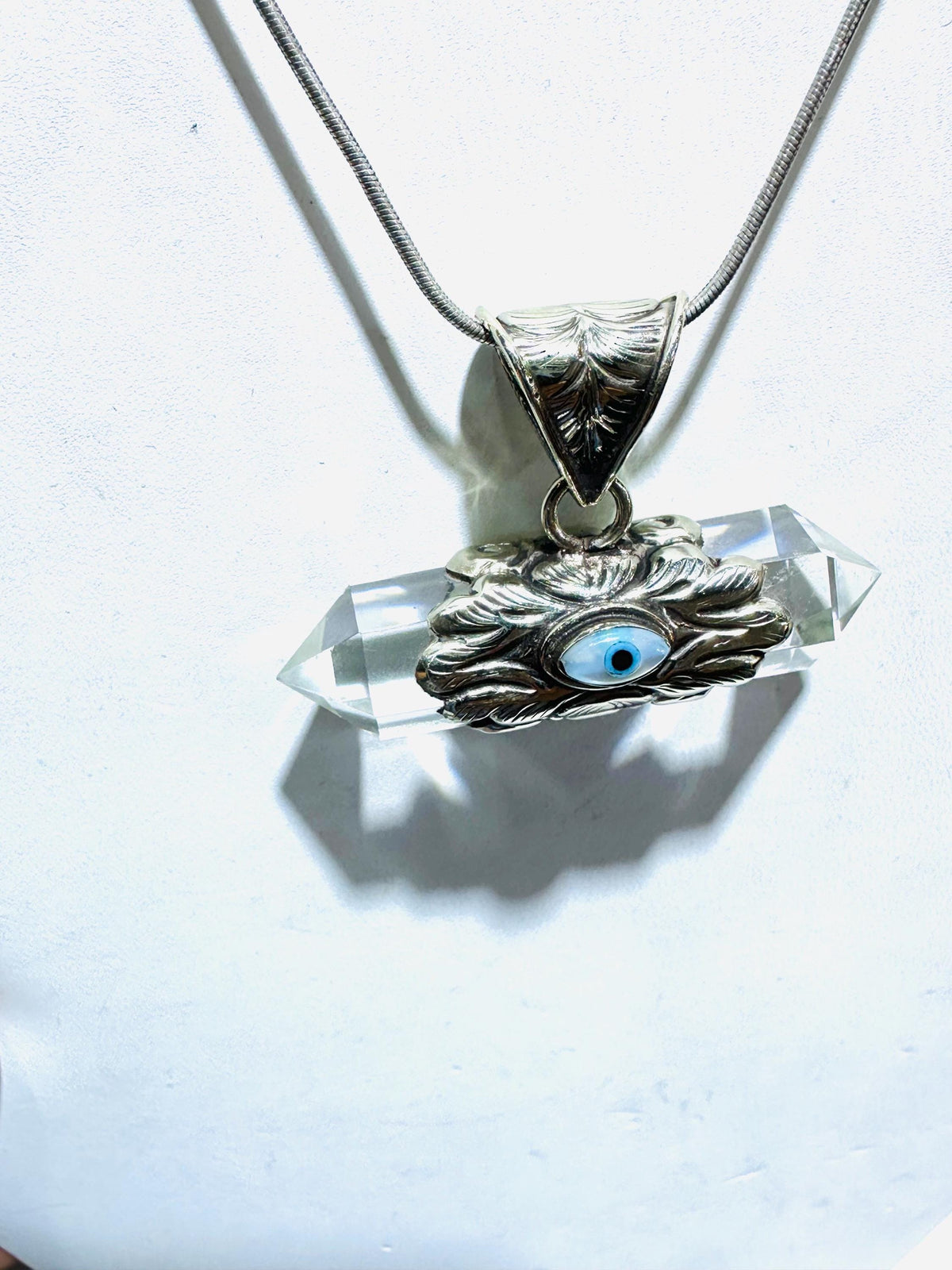 Evil eye pendant, double point Quartz crystal, handcrafted, Tibetan silver,
