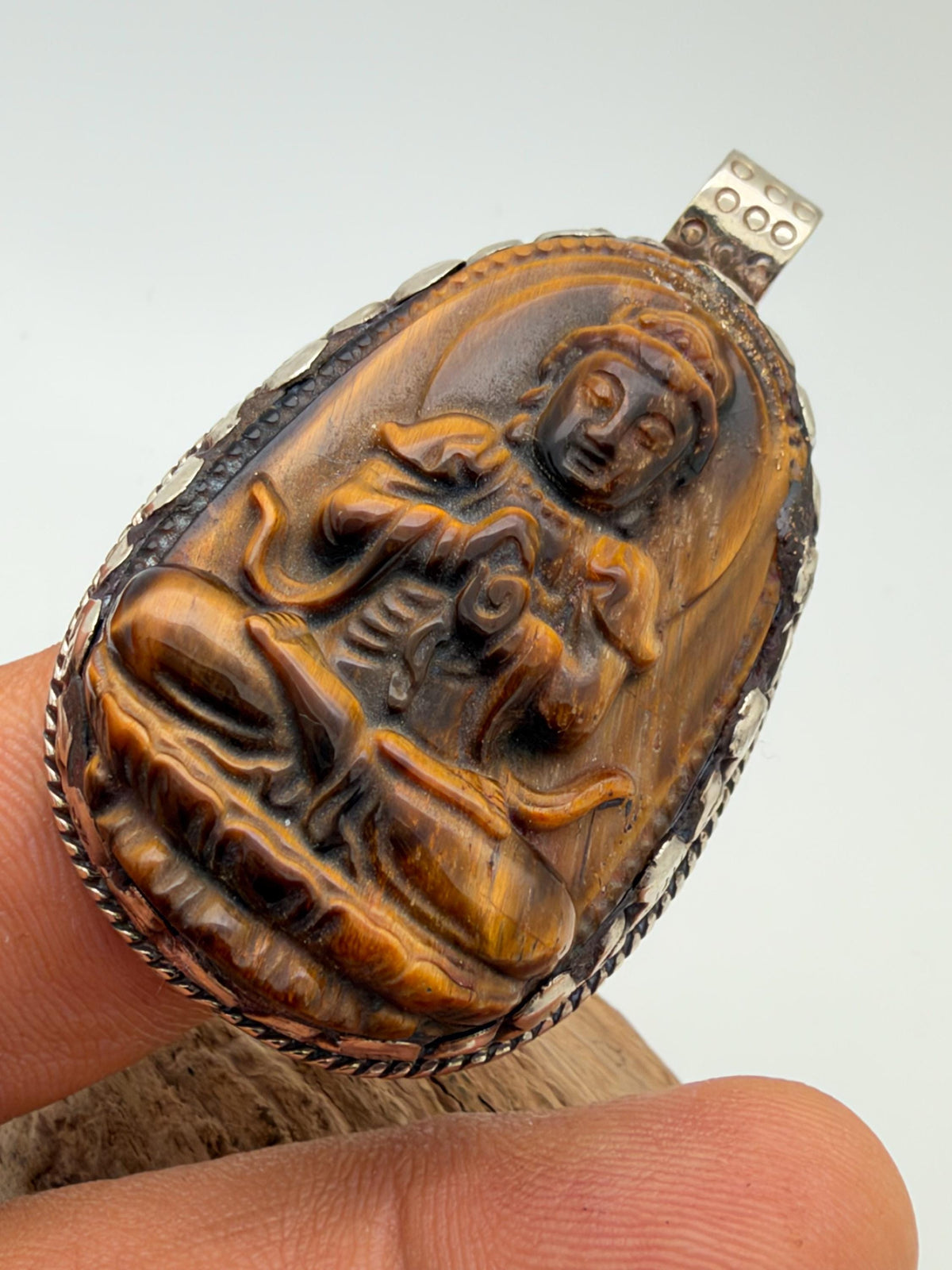 Tiger eye stone Buddha , master handcrafted with Tibetan silver