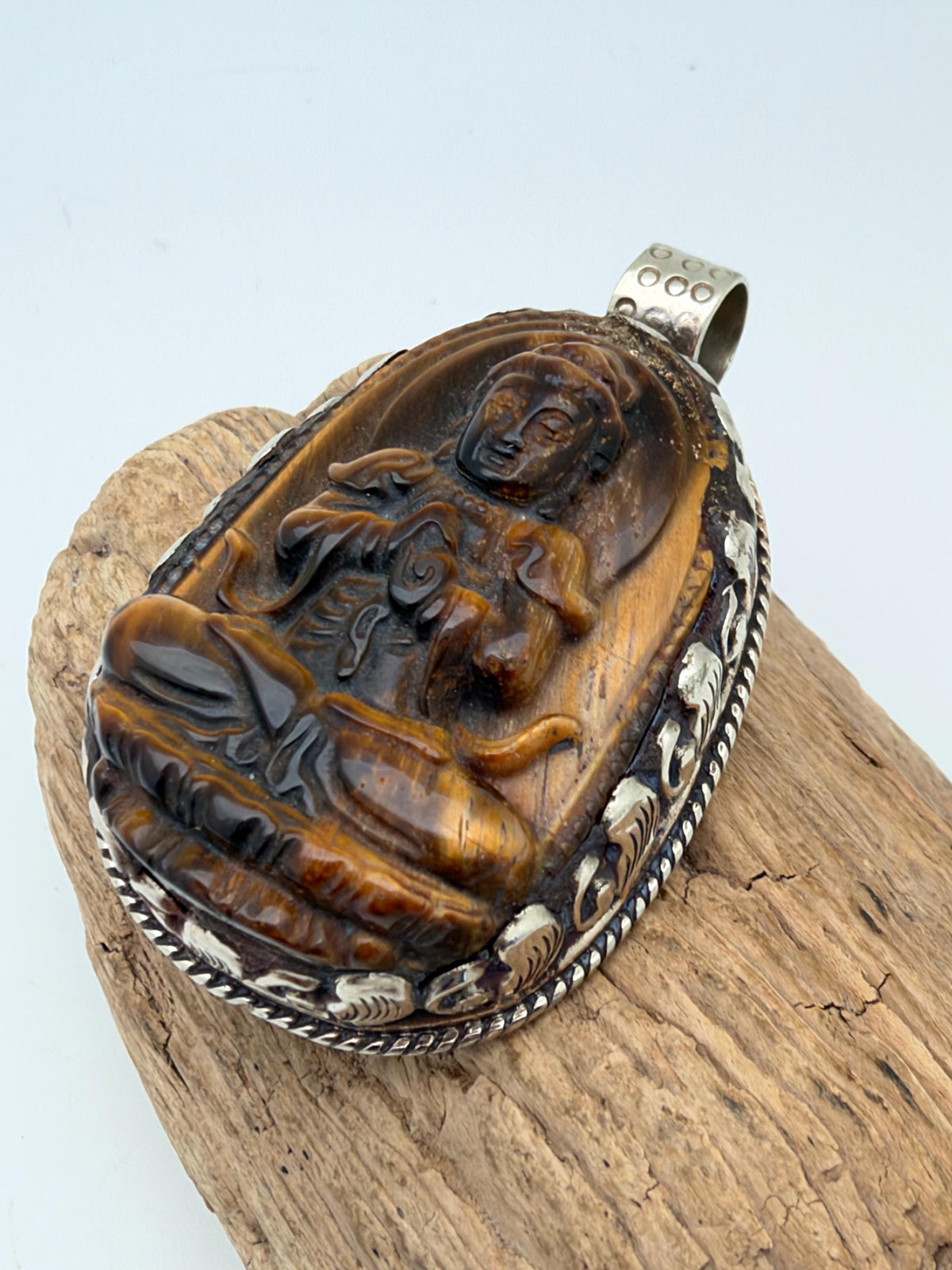 Tiger eye stone Buddha , master handcrafted with Tibetan silver