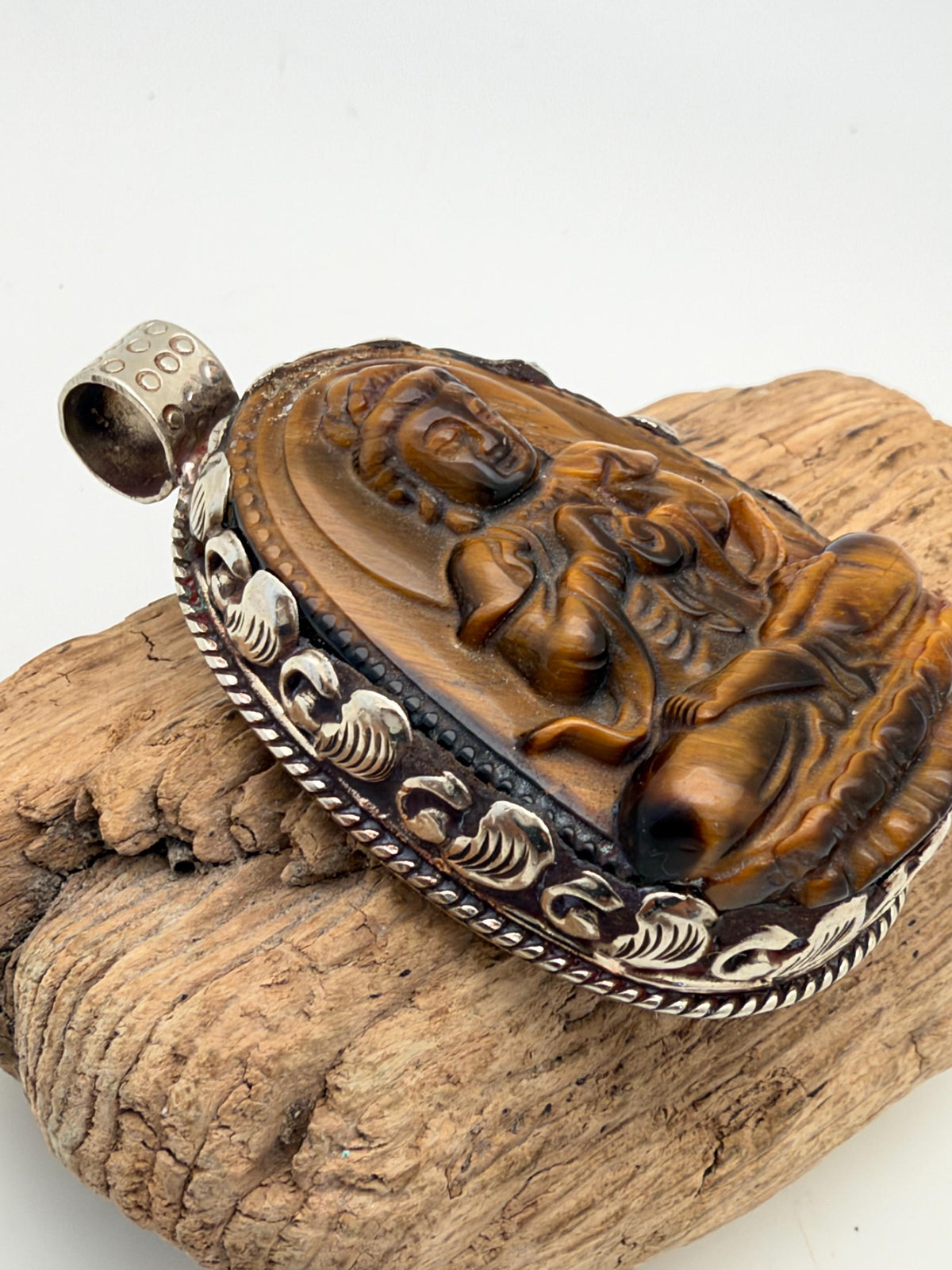 Tiger eye stone Buddha , master handcrafted with Tibetan silver
