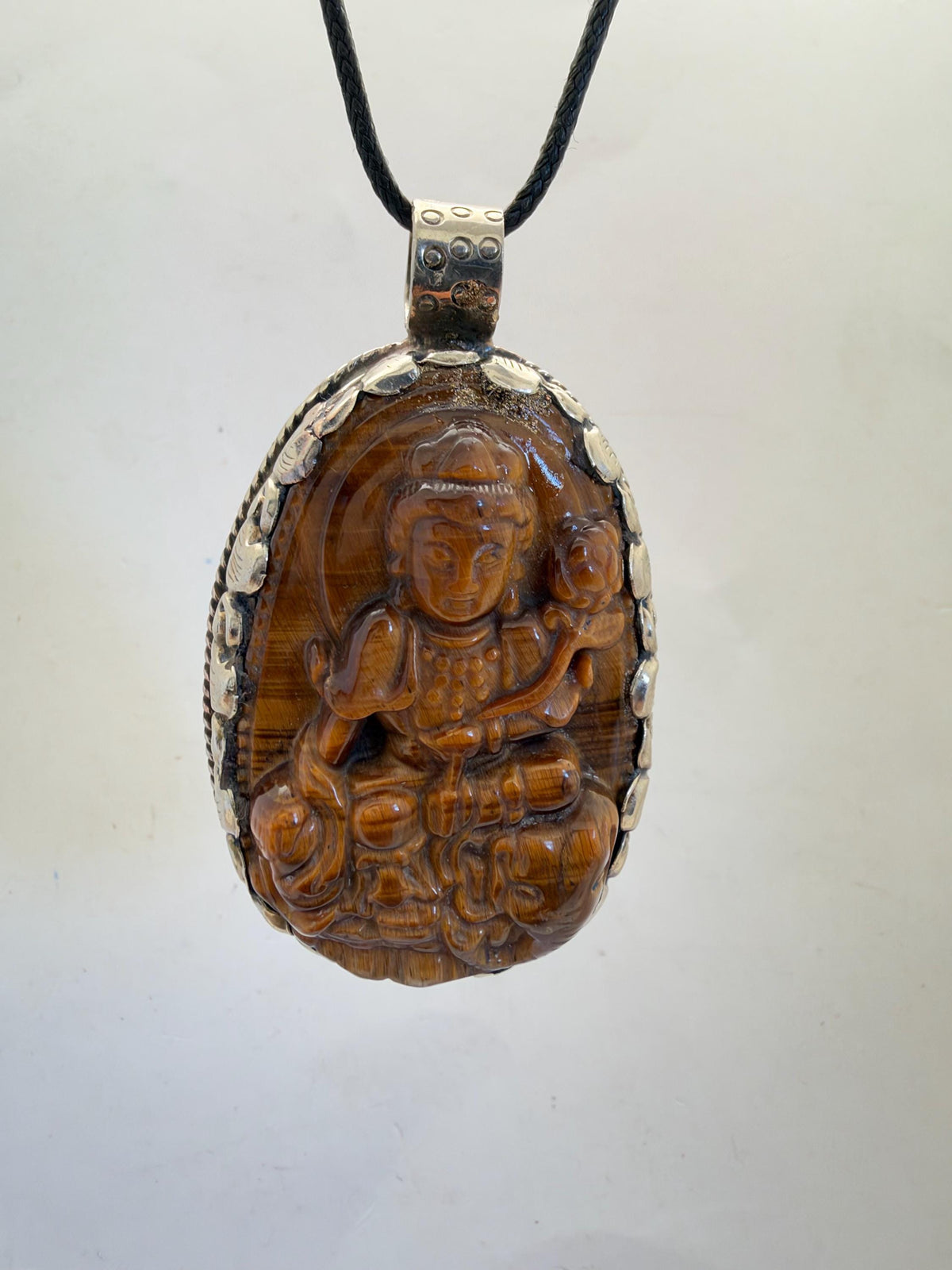 Tiger eye stone tara , master handcrafted with Tibetan silver