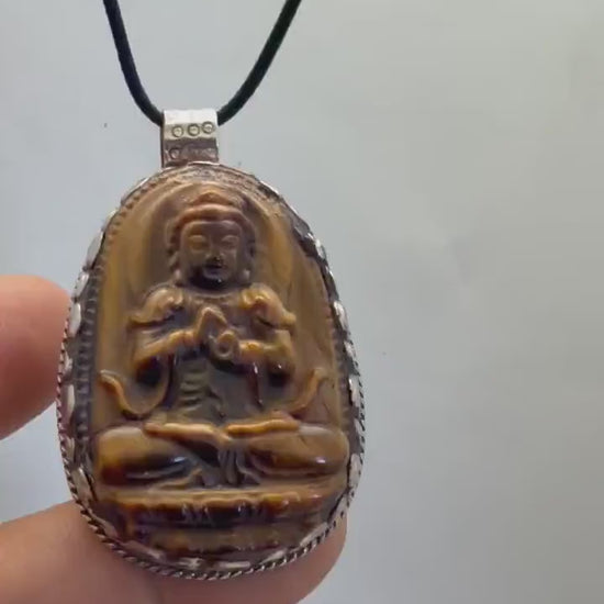Tiger eye stone Buddha , master handcrafted with Tibetan silver